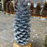 silver glittered pine cone christmas tree